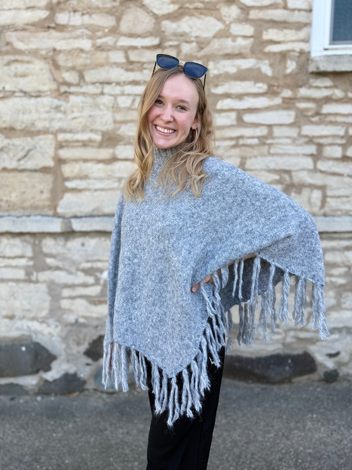 Fringed Turtleneck Poncho Sweater