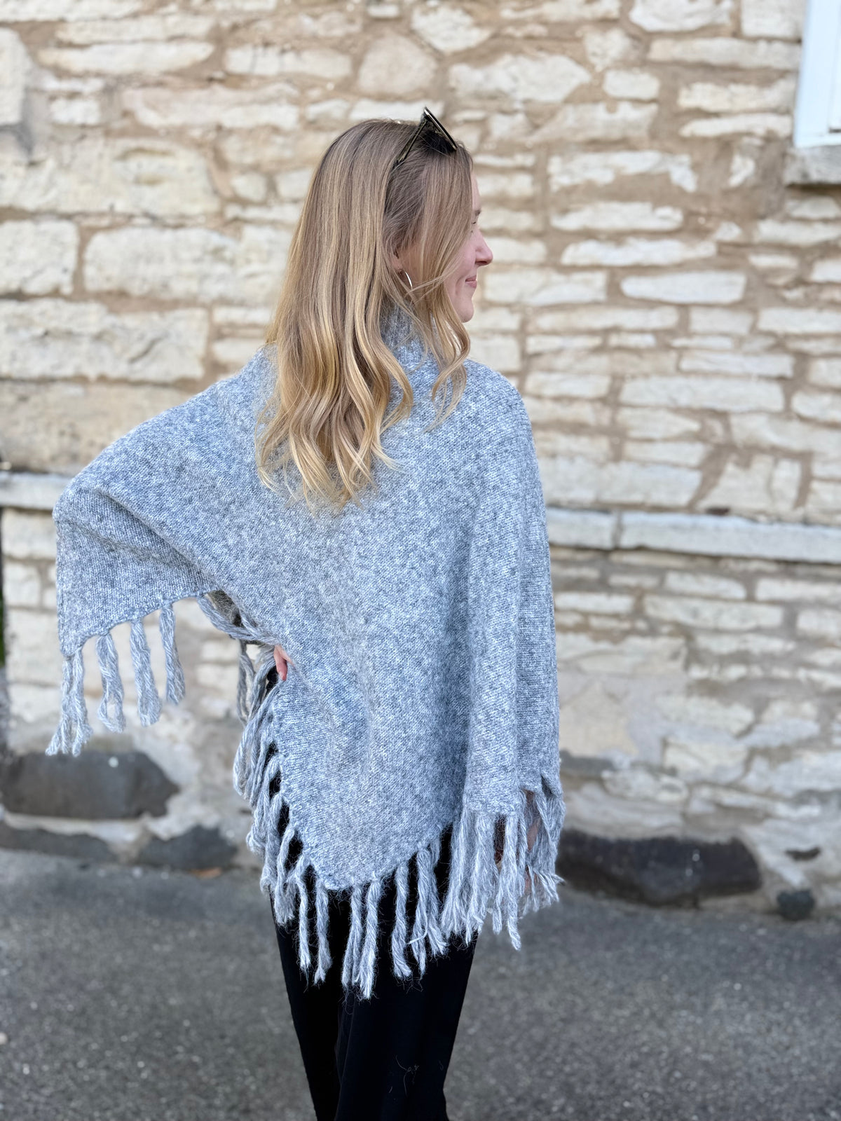 Fringed Turtleneck Poncho Sweater