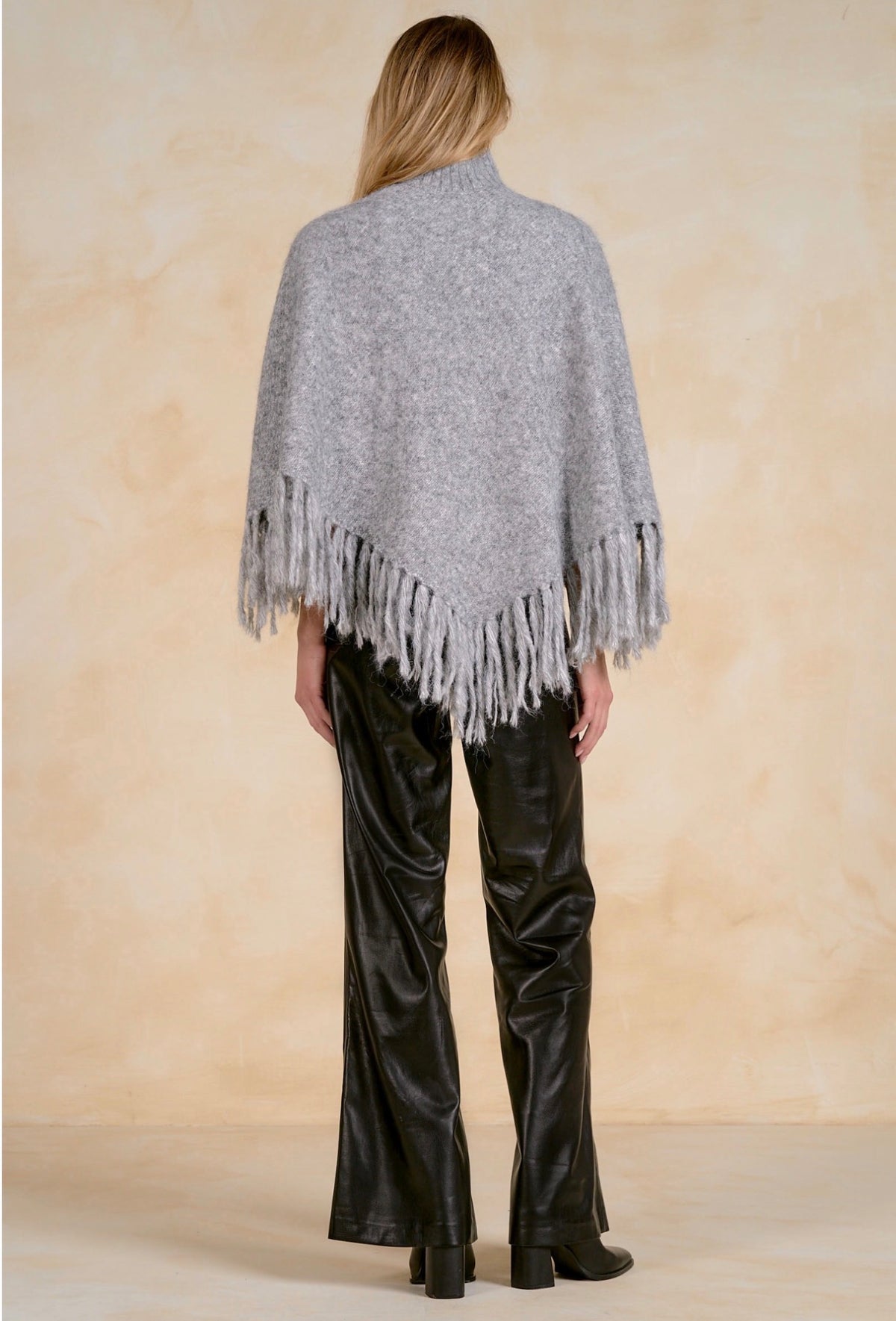 Fringed Turtleneck Poncho Sweater
