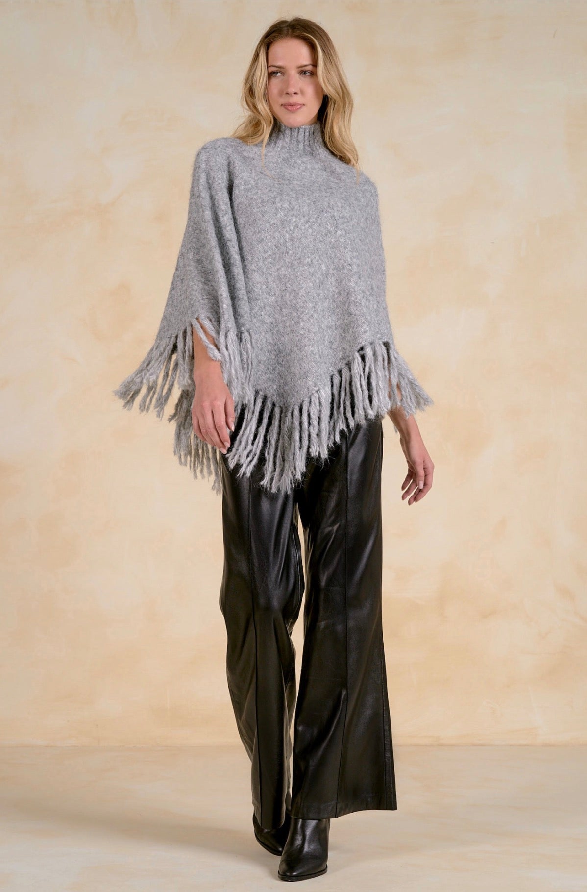 Fringed Turtleneck Poncho Sweater