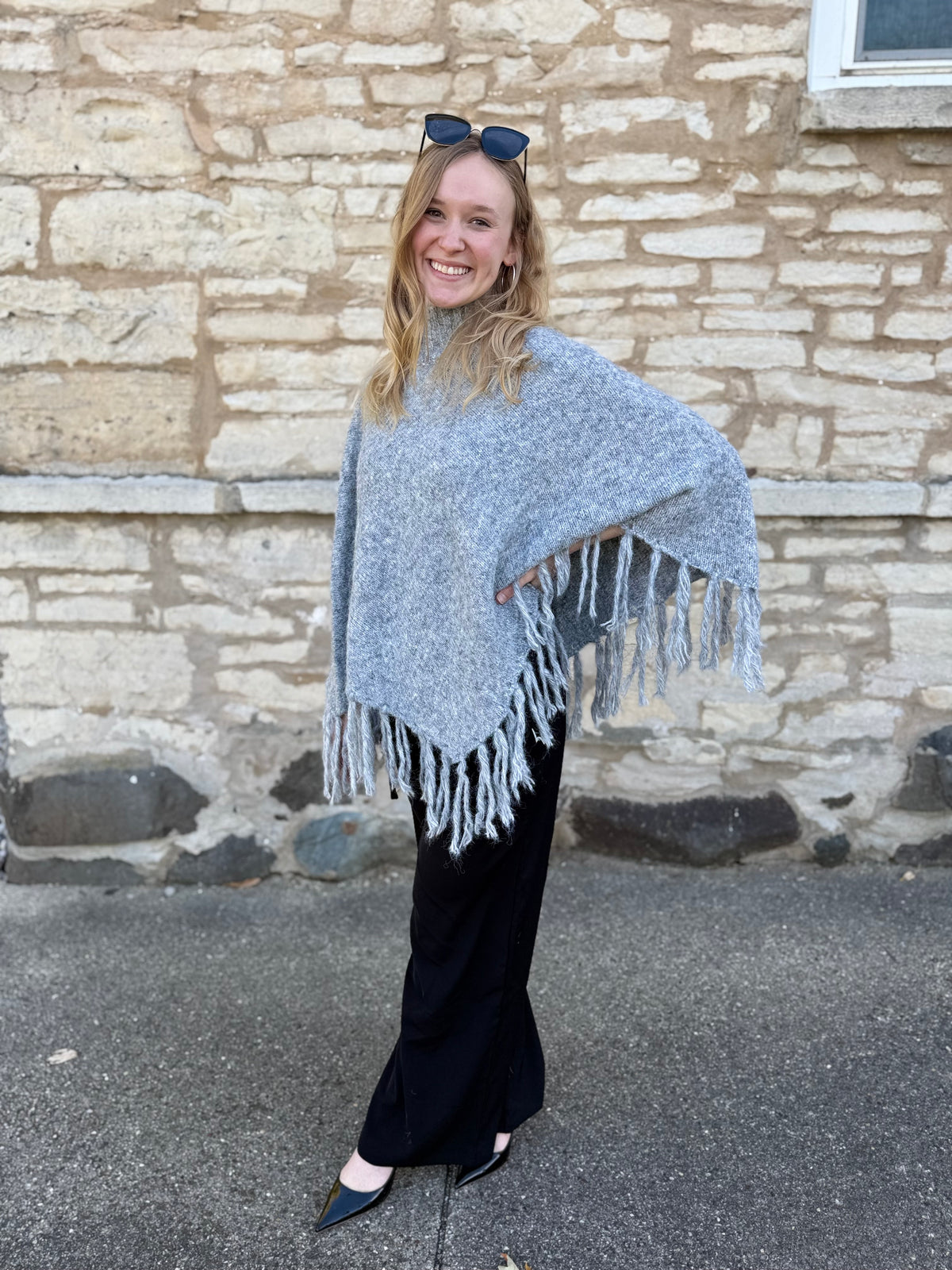 Fringed Turtleneck Poncho Sweater
